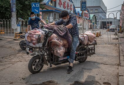 Brote en un mercado de Pekín. | EFE