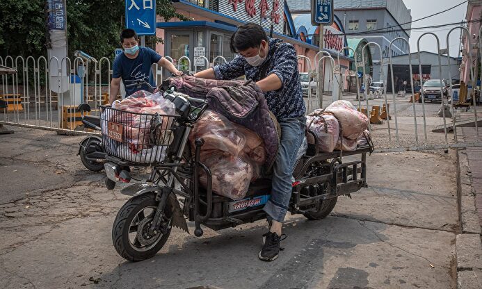 Brote en un mercado de Pekín. | EFE