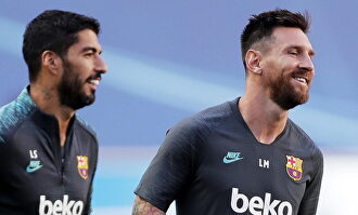 Leo Messi y Luis Suárez. | EFE