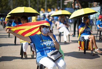 Una asistente al acto de la Diada organizado por la Asamblea Nacional Catalana. | EFE