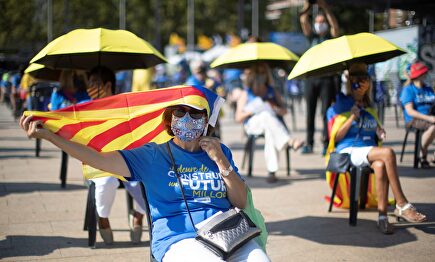 Una asistente al acto de la Diada organizado por la Asamblea Nacional Catalana. | EFE