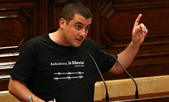 Quim Arrufat, cuando era diputado, en el Parlamento regional. | EFE
