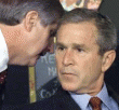 A. Card, comunicando a G. W. Bush el ataque a las Torres Gemelas. 