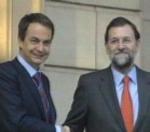 Zapatero y Rajoy, a las puertas de La Moncloa.