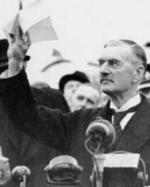 Neville Chamberlain exhibe orgulloso el acuerdo con los nazis (1938).