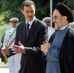 El sirio Bachar Assad y el iraní Mohamed Jatami.