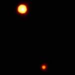 Plutón y Caronte, objeto de discusión por los astrónomos