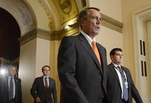 El republicano John Boehner, junto a congresistas del partido. | Efe