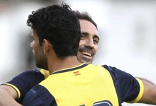 Juanfran celebra un gol con Diego Costa. | Archivo