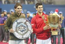 Novak Djokovic y Rafael Nadal, despus de la final | Efe