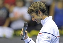 Juan Carlos Ferrero, visiblemente emocionado en su despedida de las pistas. | EFE