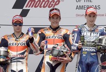 Mrquez, en lo ms alto del podio junto a Pedrosa, segundo, y Lorenzo, tercero. | EFE