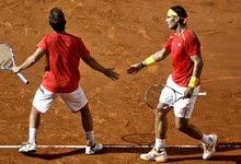 Nadal y Lpez, durante el partido de dobles. | EFE
