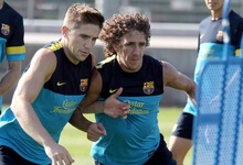 Puyol (d) y Fonts, durante el entrenamiento. | Foto: Miguel Ruiz (fcbarcelona.com)