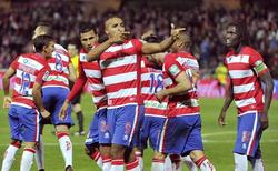 El Arabi celebra uno de sus tres goles al Mlaga en el derbi. | EFE