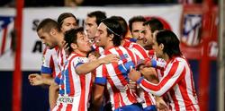 Los jugadores del Atlético de Madrid celebran la sufrida victoria ante el Málaga. | EFE