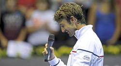 Juan Carlos Ferrero, visiblemente emocionado en su despedida de las pistas. | EFE