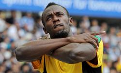 Usain Bolt, tras ganar su serie de los 200 metros en los Mundiales de Daegu. | EFE