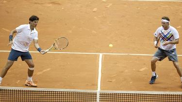 Rafa Nadal y David Nalbandian, durante el torneo de dobles del Abierto de Brasil. | EFE