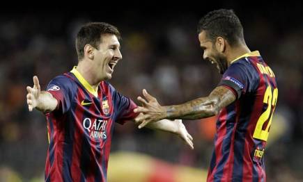 Messi celebra con Alves en su etapa como jugador azulgrana. | EFE