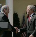 George W. Bush y Iyad Alaui.