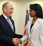 Ehud Olmert y Condoleezza Rice.