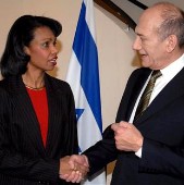 Ehud Olmert y Condoleezza Rice.
