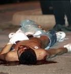 Un Latin King yace herido en el suelo de Madrid